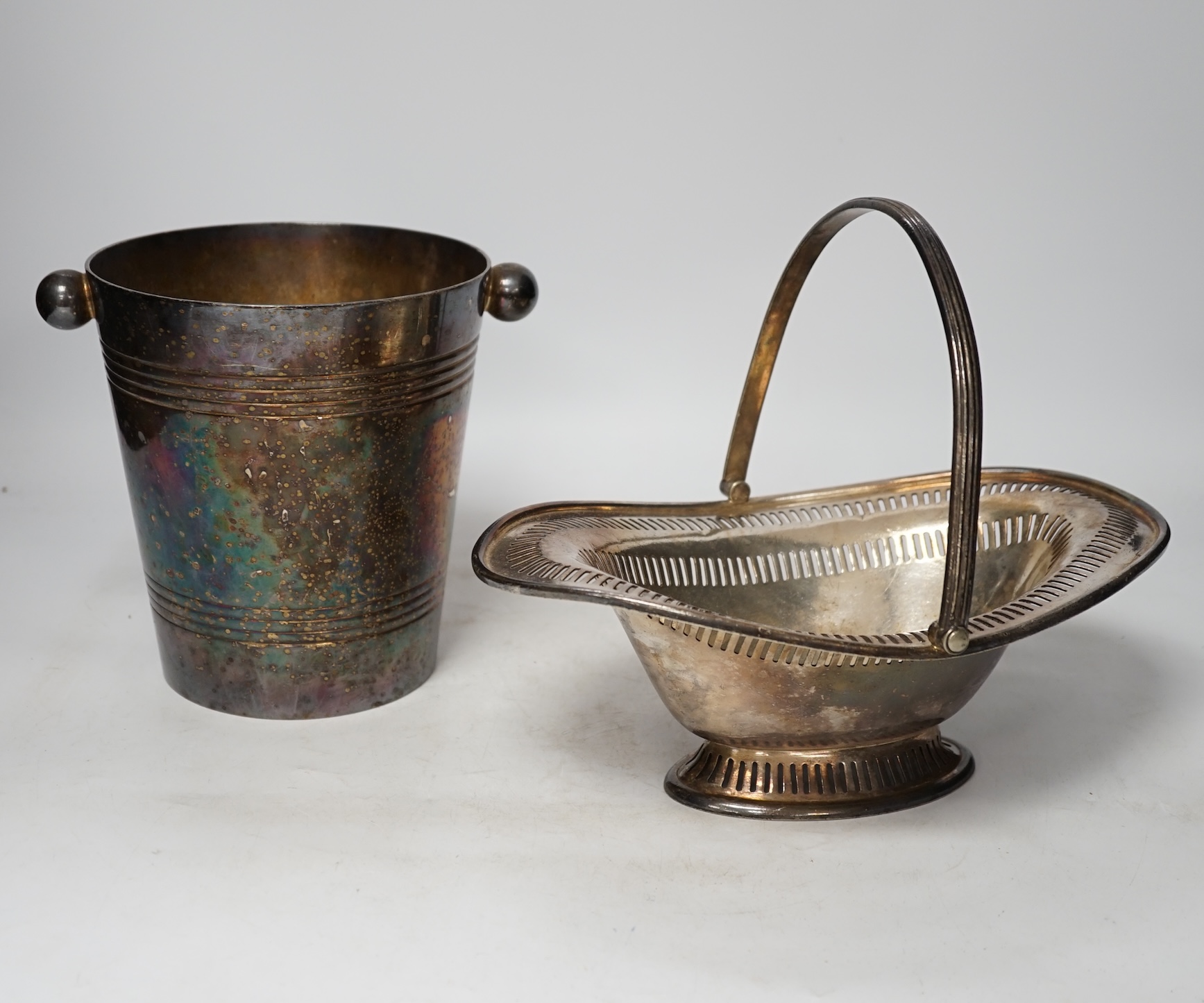 Two Savoy Hotel silver plated items comprising ice bucket and basket with swing handle together with a leather cased travelling picnic tea set. Condition - fair